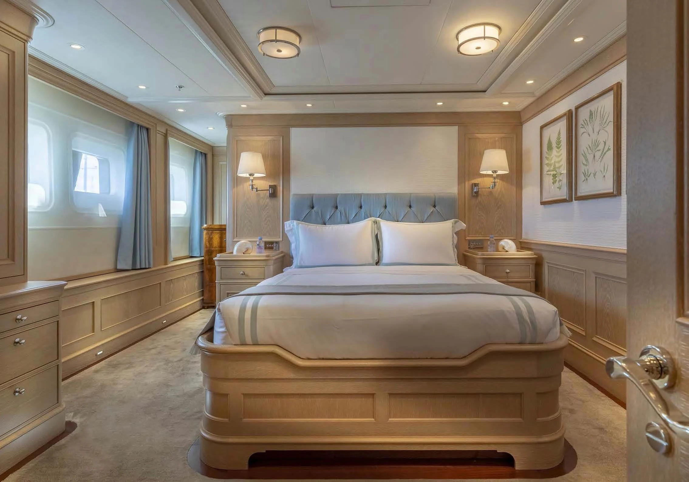 a large bed in a room aboard FABULOUS CHARACTER Yacht for Charter