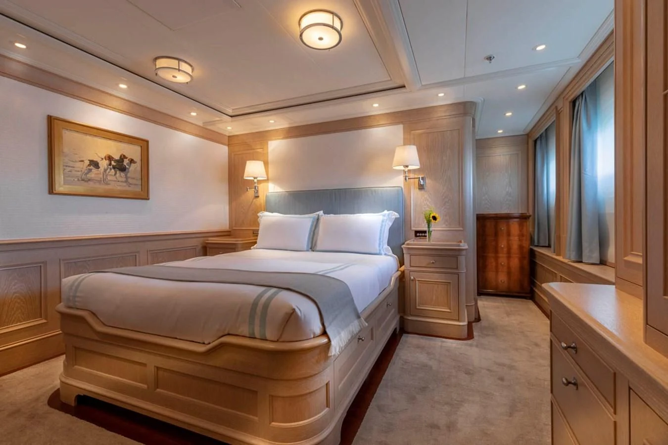 a large bedroom with a large bed aboard FABULOUS CHARACTER Yacht for Charter