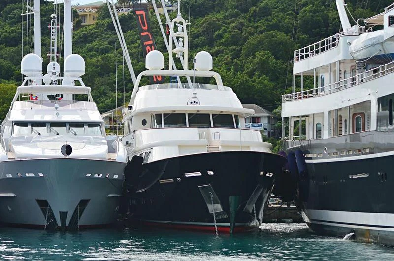 several boats docked in a harbor aboard FABULOUS CHARACTER Yacht for Charter