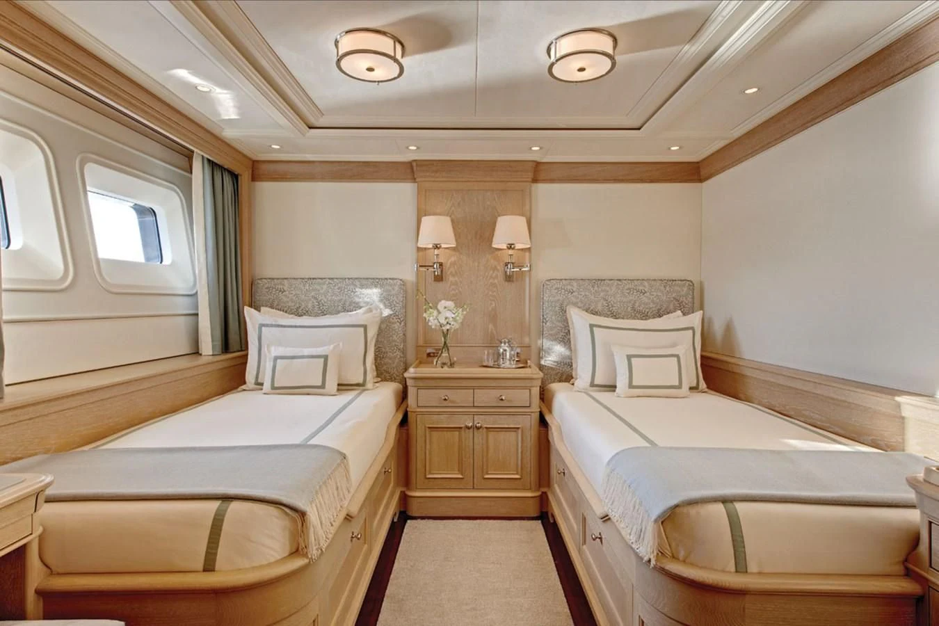 a room with two beds aboard FABULOUS CHARACTER Yacht for Charter