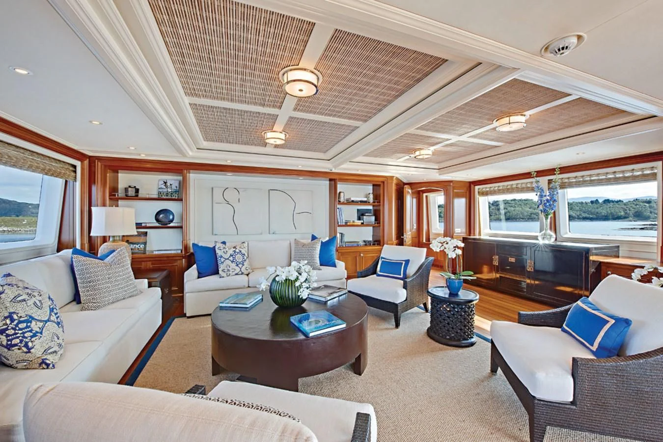 a living room with a large open window aboard FABULOUS CHARACTER Yacht for Charter