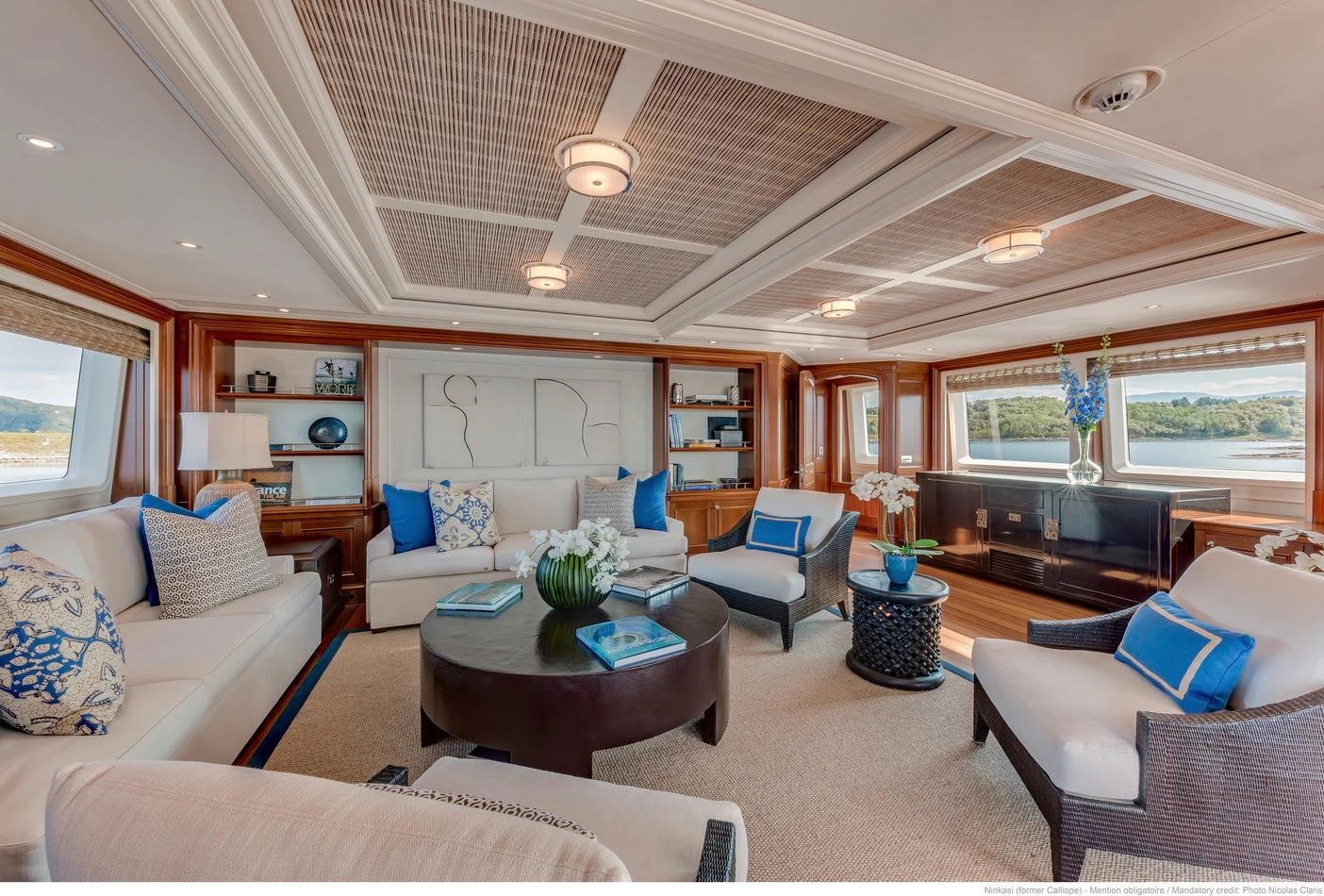 a living room with a large open window aboard FABULOUS CHARACTER Yacht for Charter