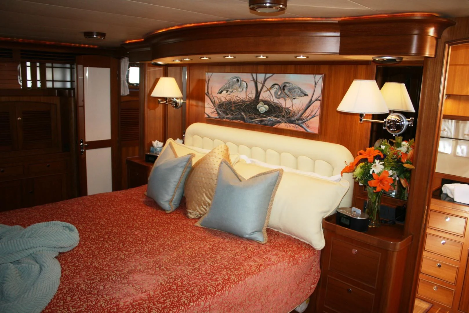 a bed with a large bed aboard VK Yacht for Sale