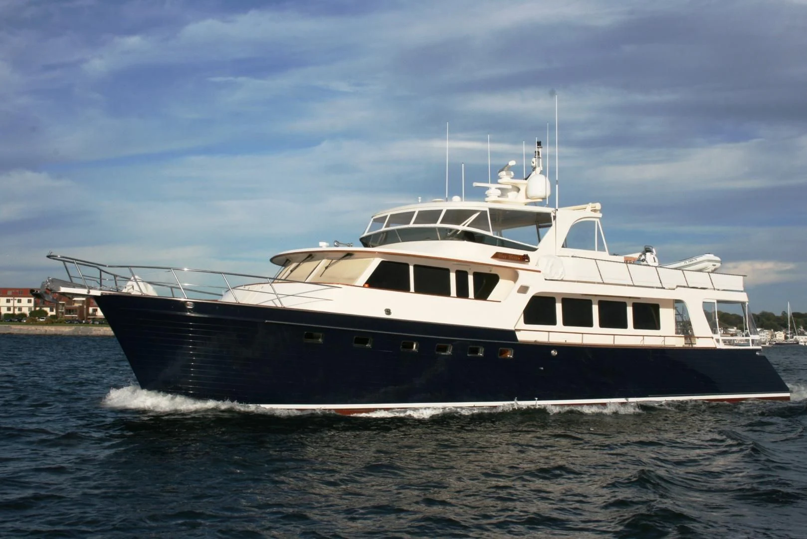 a large white boat aboard VK Yacht for Sale