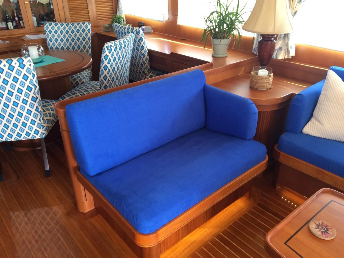 a couch in a living room aboard VK Yacht for Sale