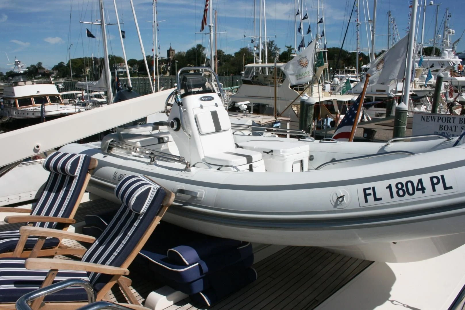 a boat docked at a pier aboard VK Yacht for Sale
