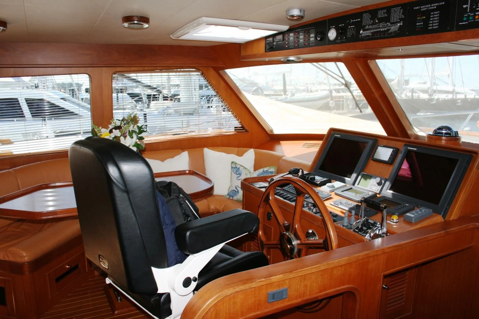 a room with a desk and computer aboard VK Yacht for Sale