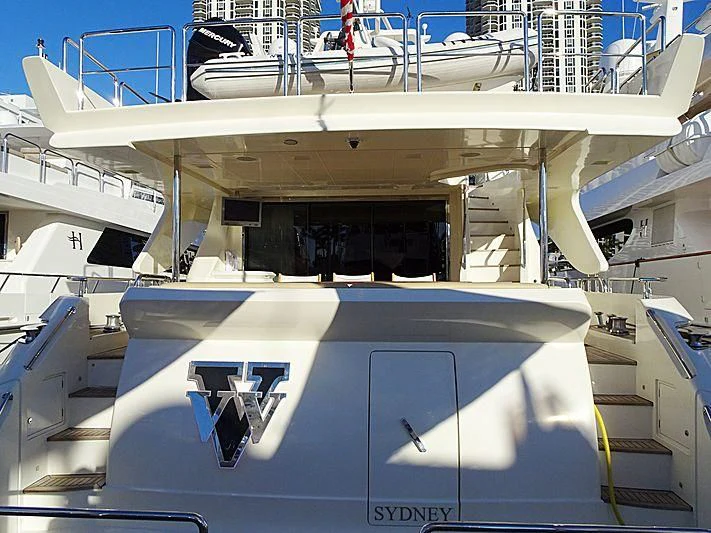 a large white boat with a satellite dish on it aboard DIVA Yacht for Sale