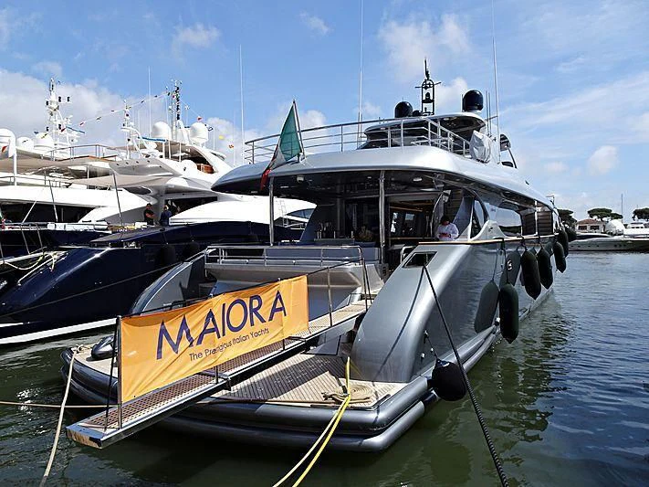 a boat tied to a dock aboard SANDS Yacht for Sale