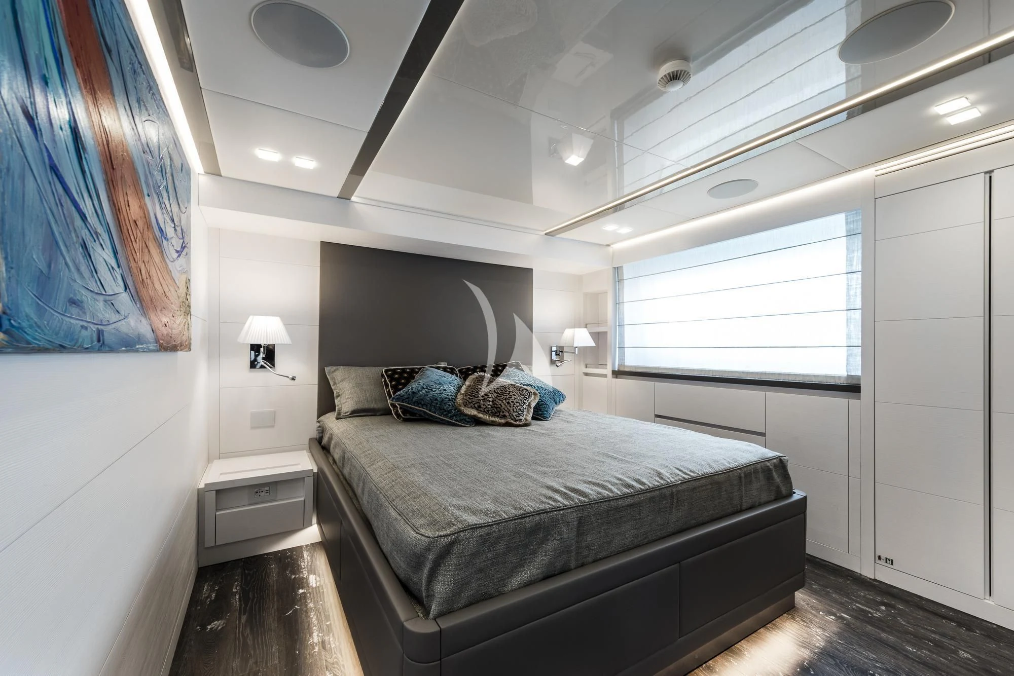 a bed in a room aboard SANDS Yacht for Sale