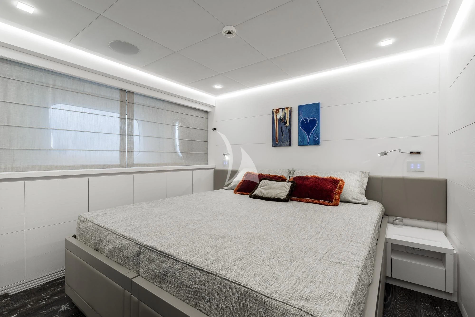 a bed in a room aboard SANDS Yacht for Sale