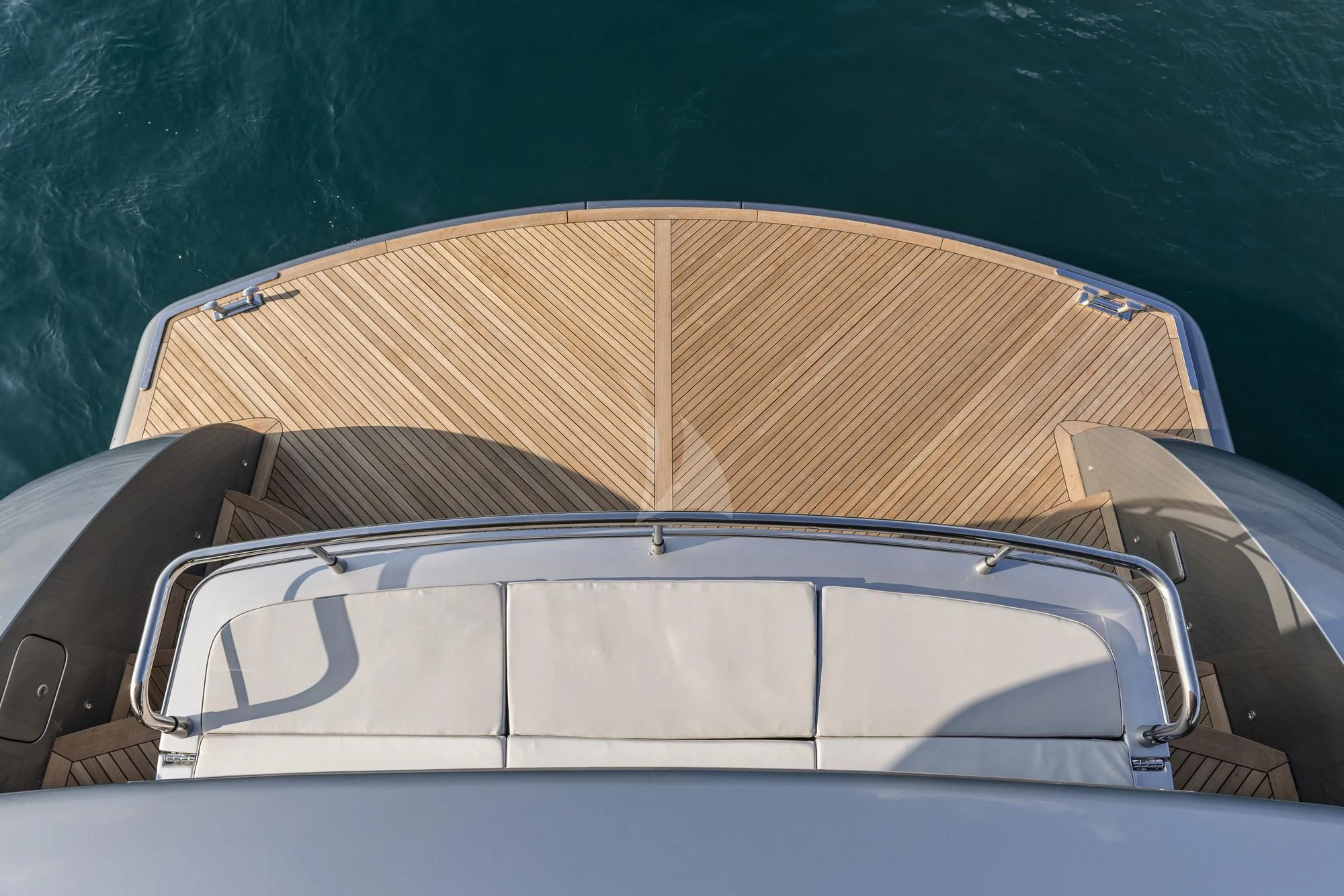 a car with a large spoiler aboard SANDS Yacht for Sale