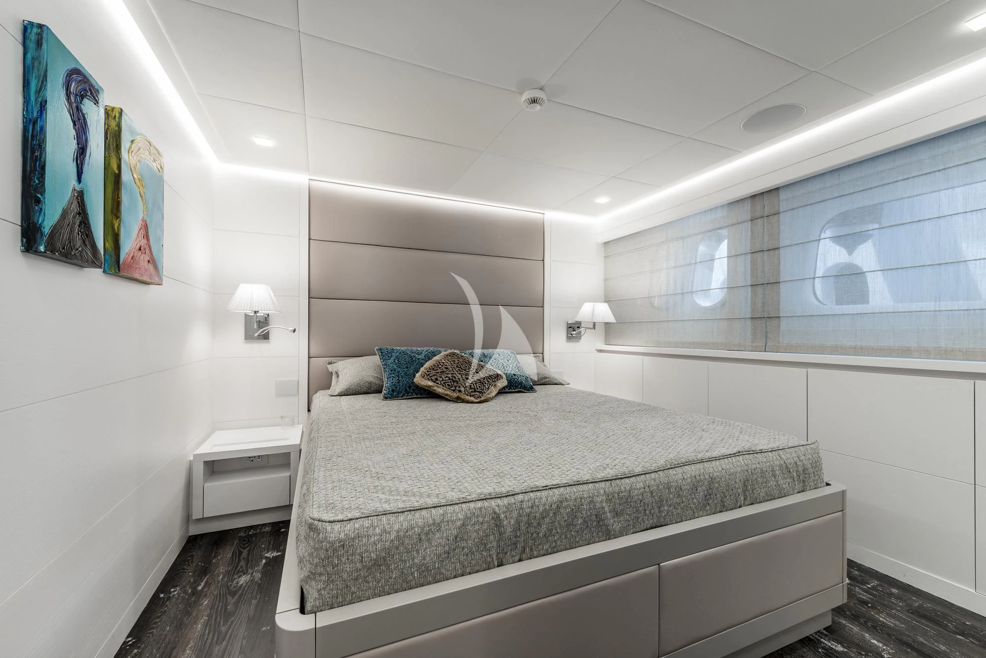 a bed in a room aboard SANDS Yacht for Sale