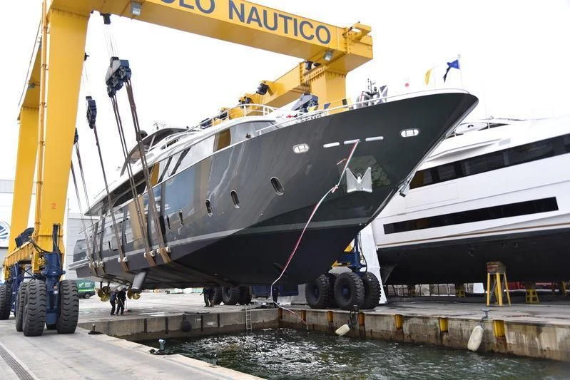 a large boat on a trailer aboard SANDS Yacht for Sale