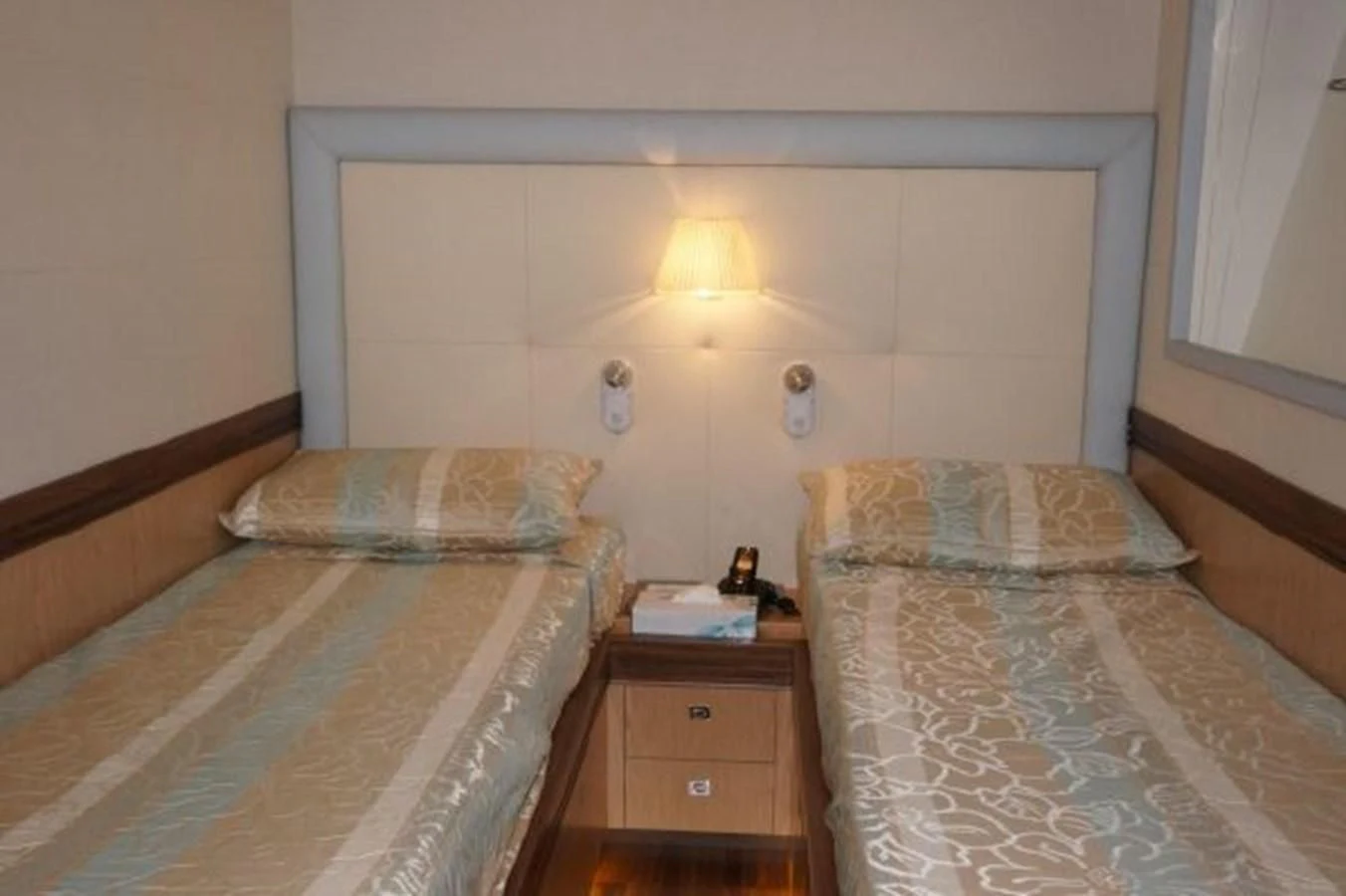 a couple of beds in a room aboard SANGRIA Yacht for Sale