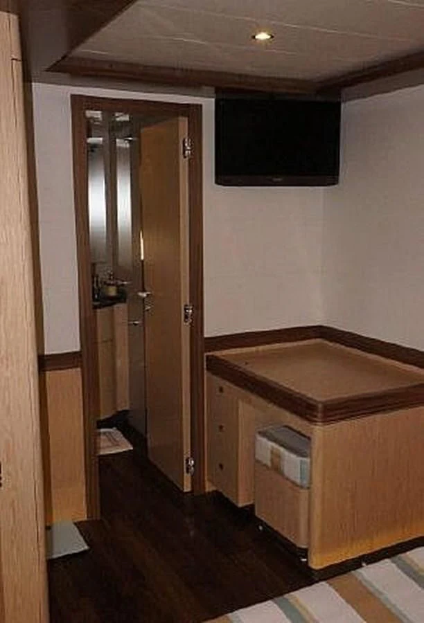 a room with a counter and a sink aboard SANGRIA Yacht for Sale