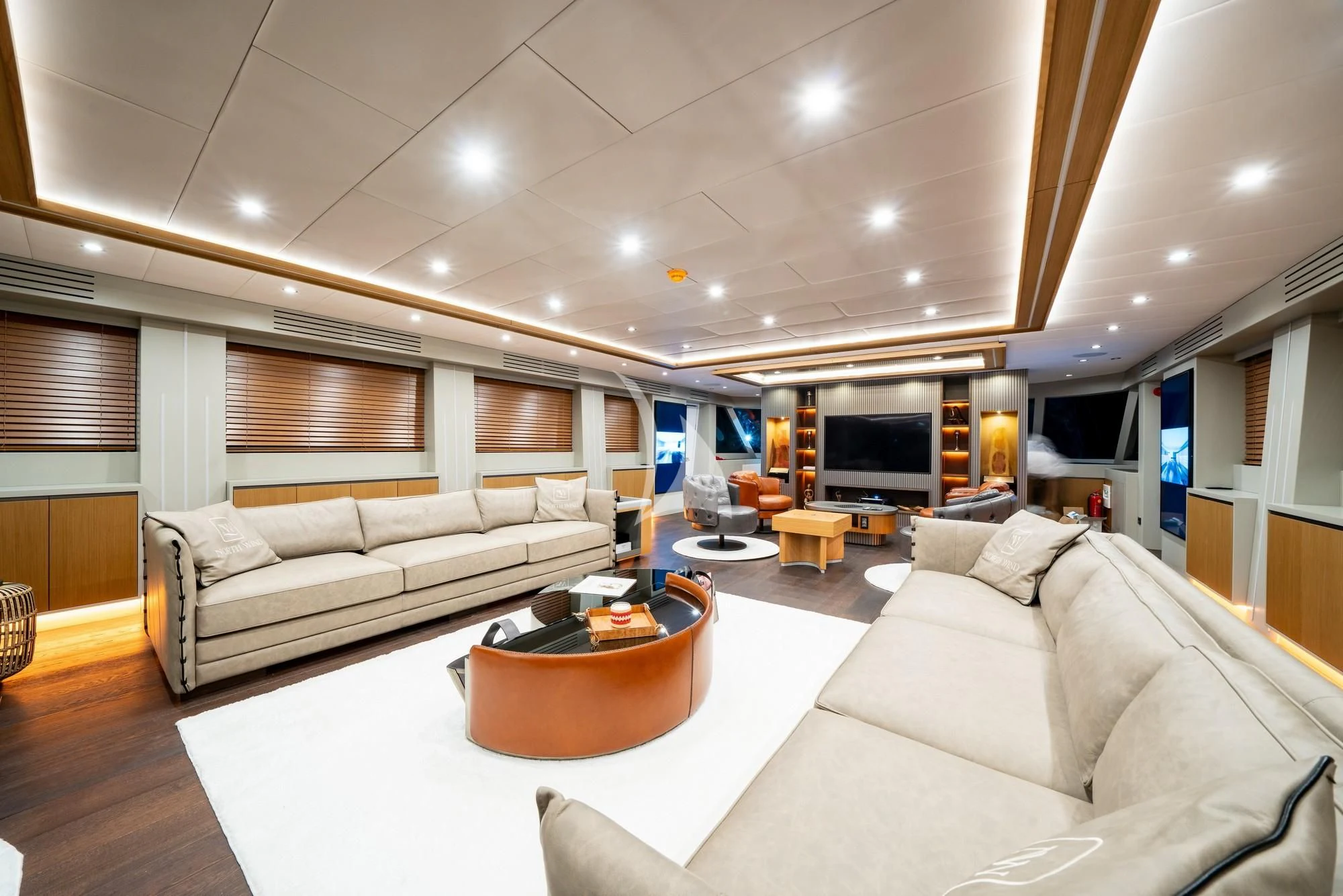 a living room with a couch and a table aboard NORTH WIND Yacht for Sale