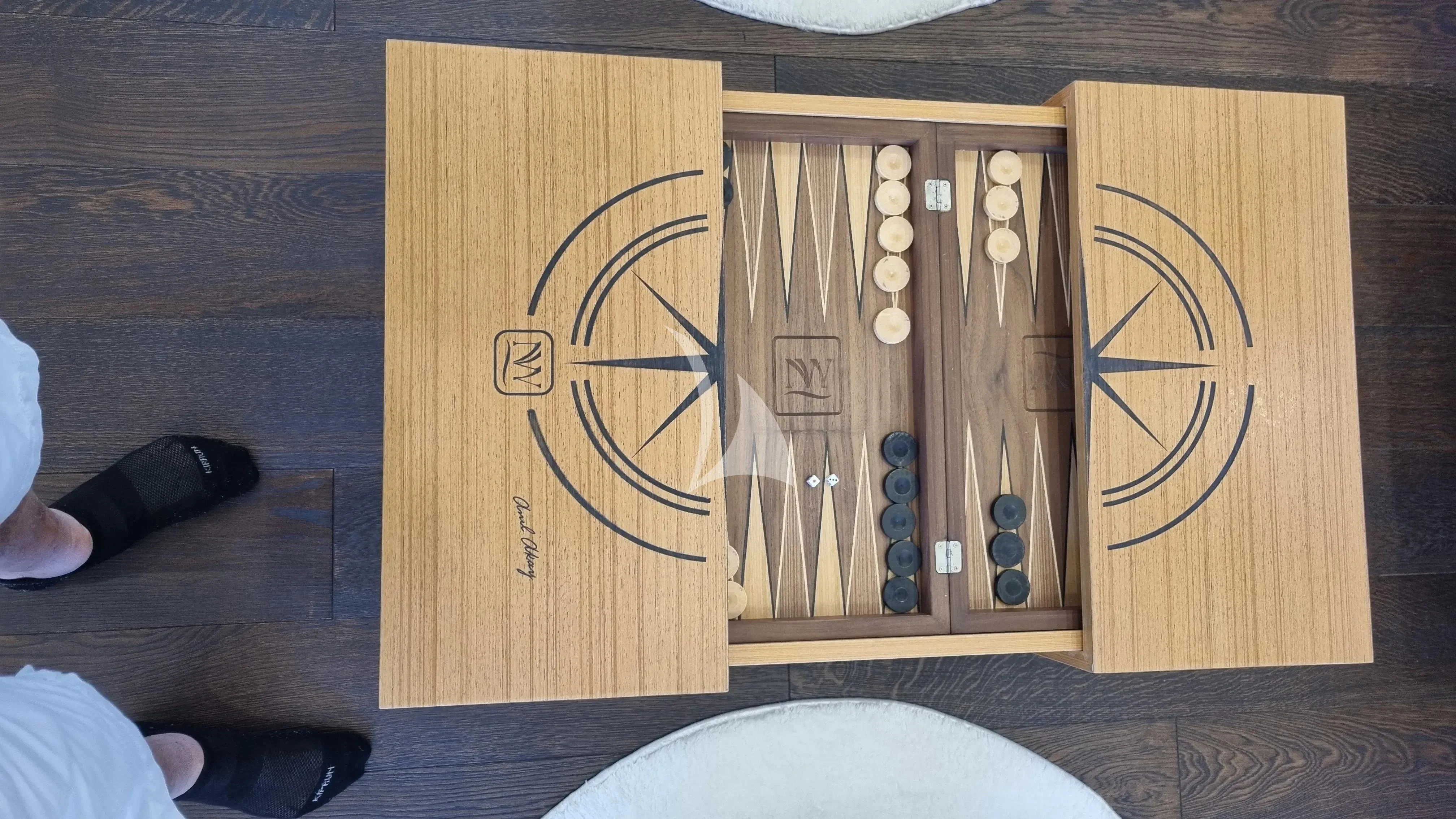 a wood board with a design on it aboard NORTH WIND Yacht for Sale