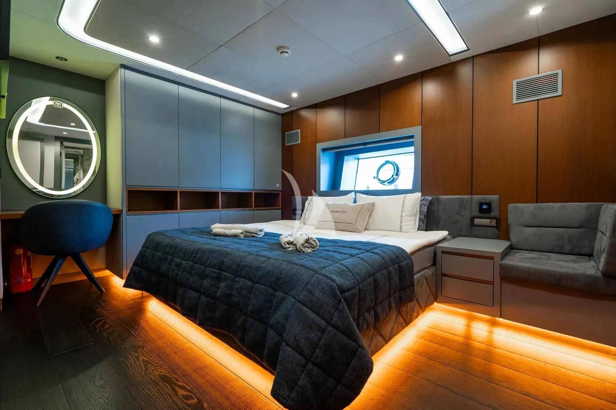a bedroom with a bed and a tv aboard NORTH WIND Yacht for Sale