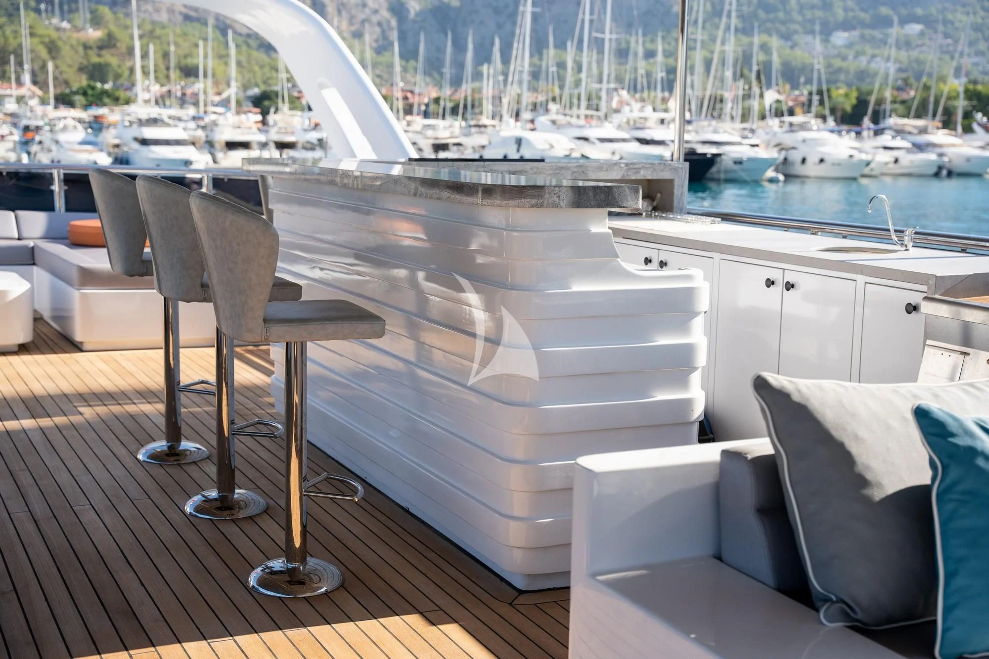 a room with a table and chairs aboard NORTH WIND Yacht for Sale