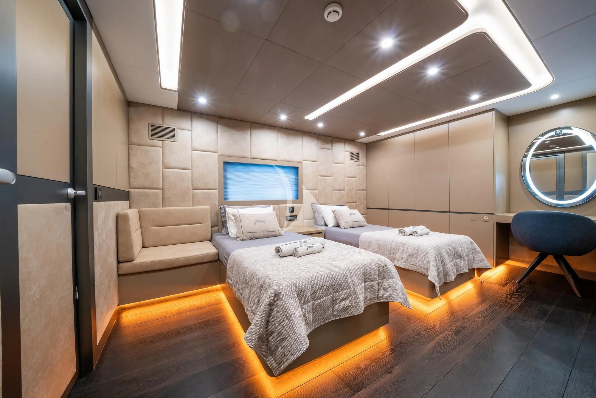 a room with a bed and a tv on the wall aboard NORTH WIND Yacht for Sale
