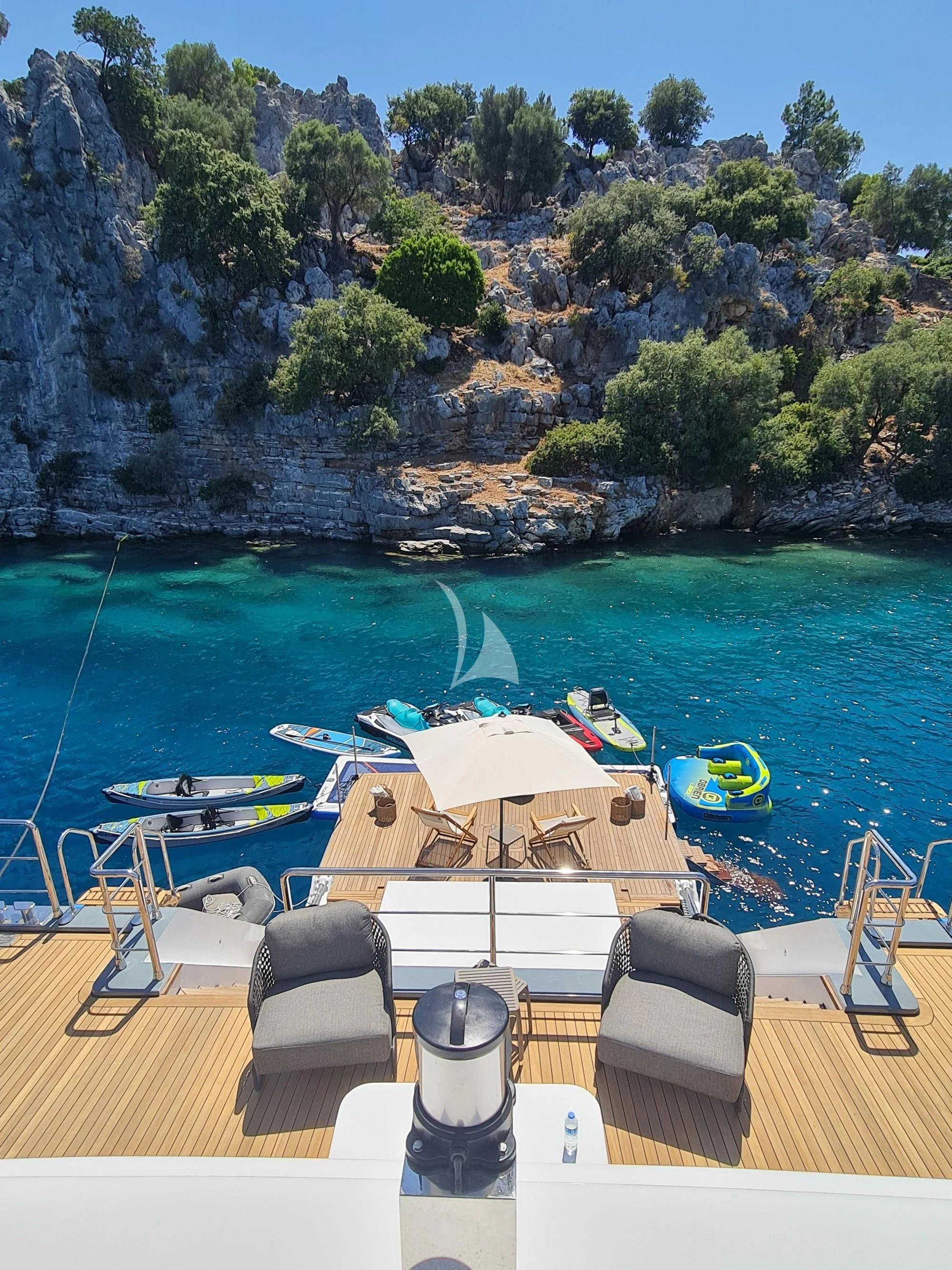 a boat on a body of water aboard NORTH WIND Yacht for Sale