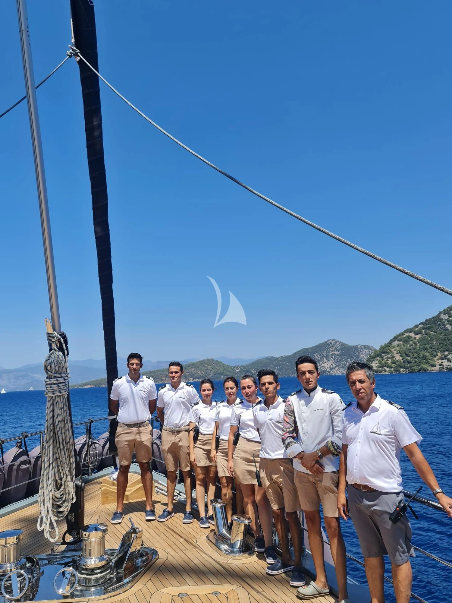 a group of people on a dock aboard NORTH WIND Yacht for Sale