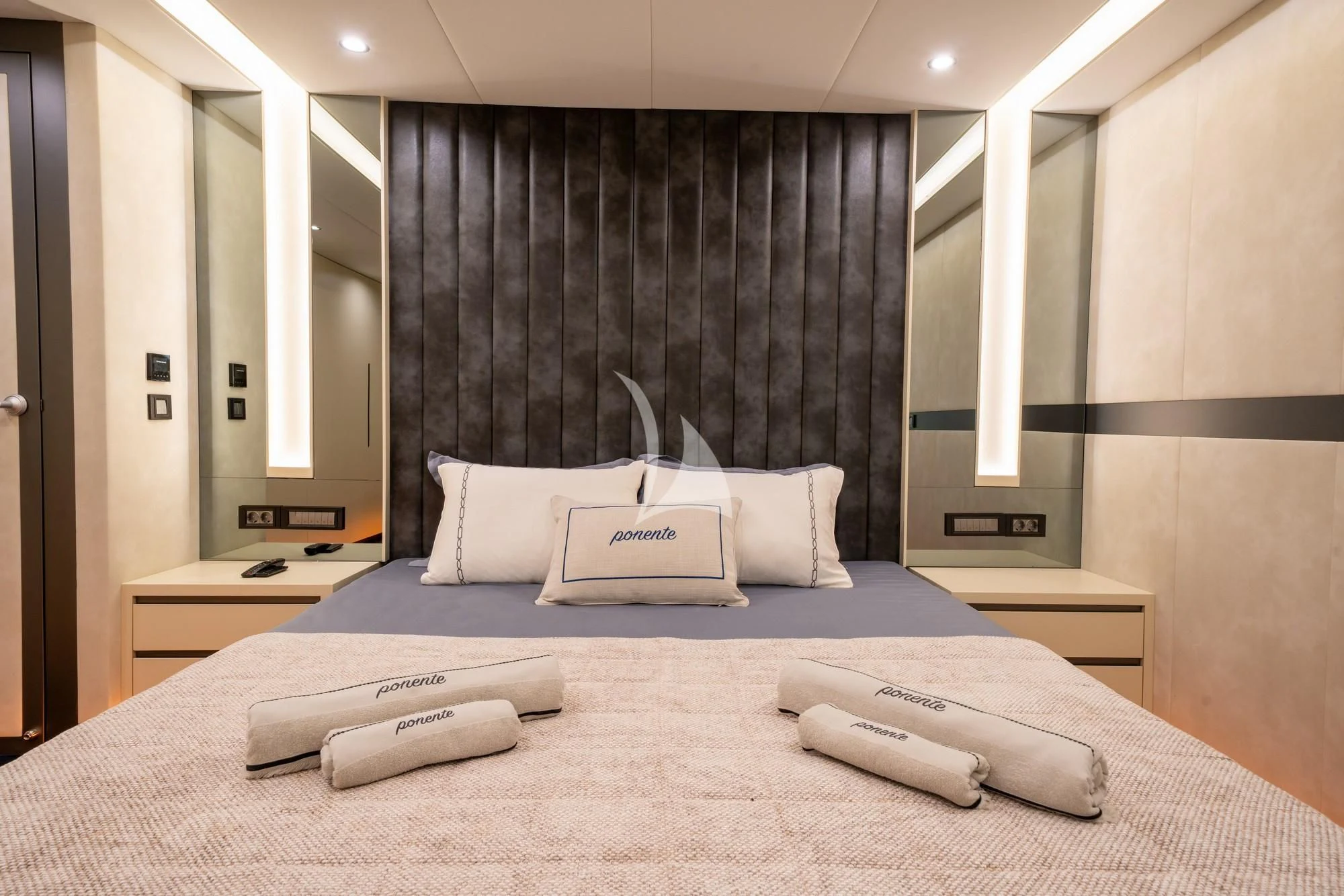 a bed with a white pillow aboard NORTH WIND Yacht for Sale