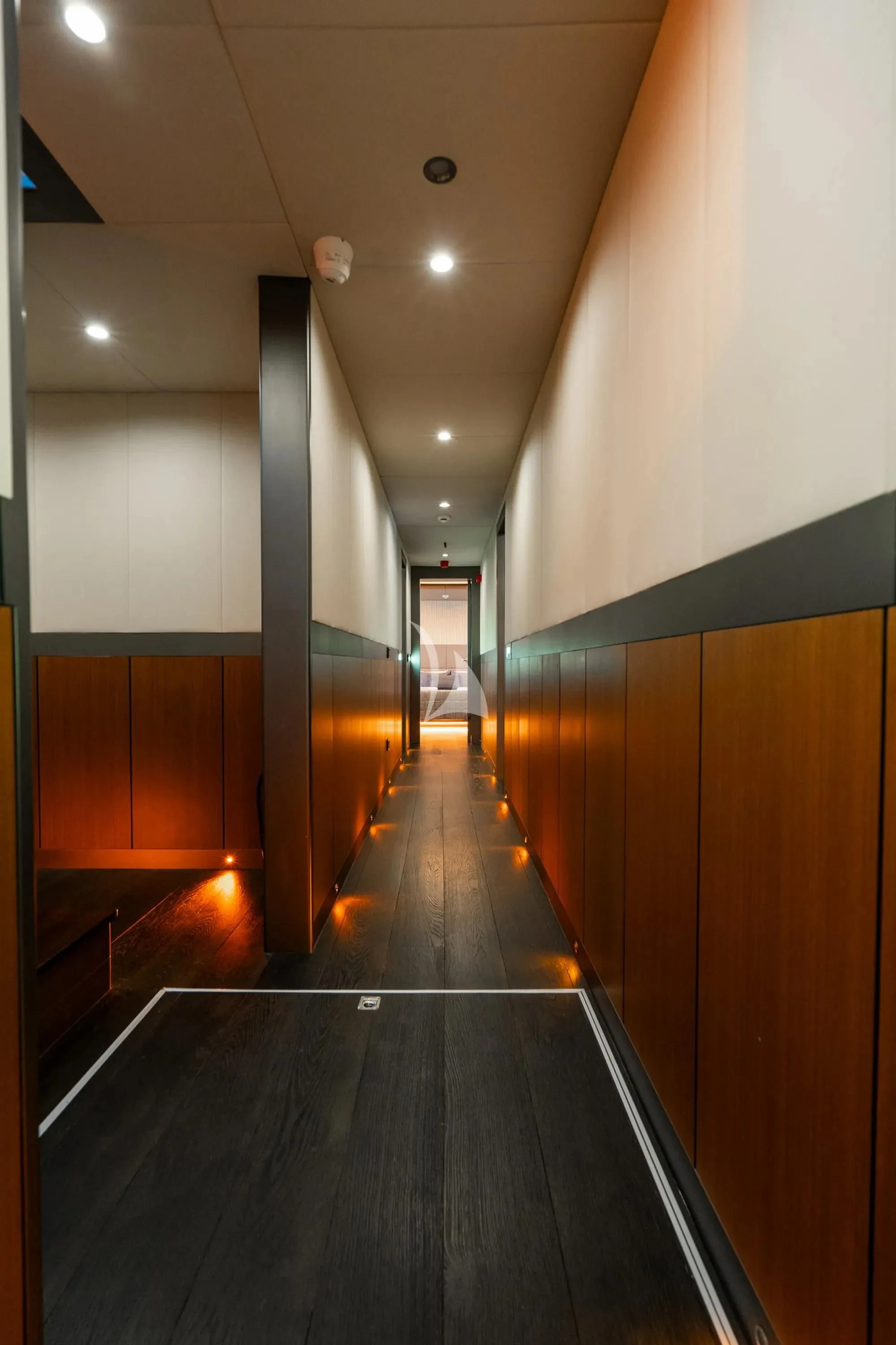a long hallway with a few doors aboard NORTH WIND Yacht for Sale