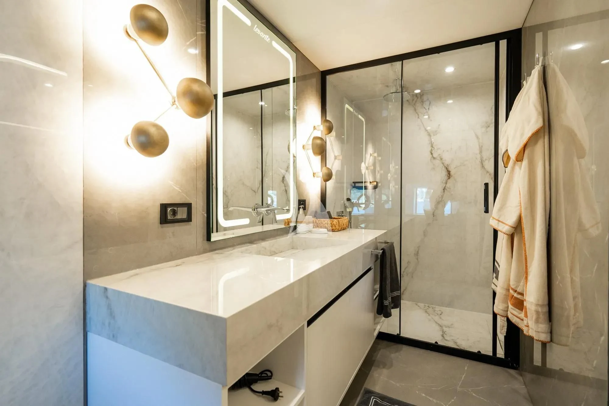 a bathroom with a large mirror aboard NORTH WIND Yacht for Sale