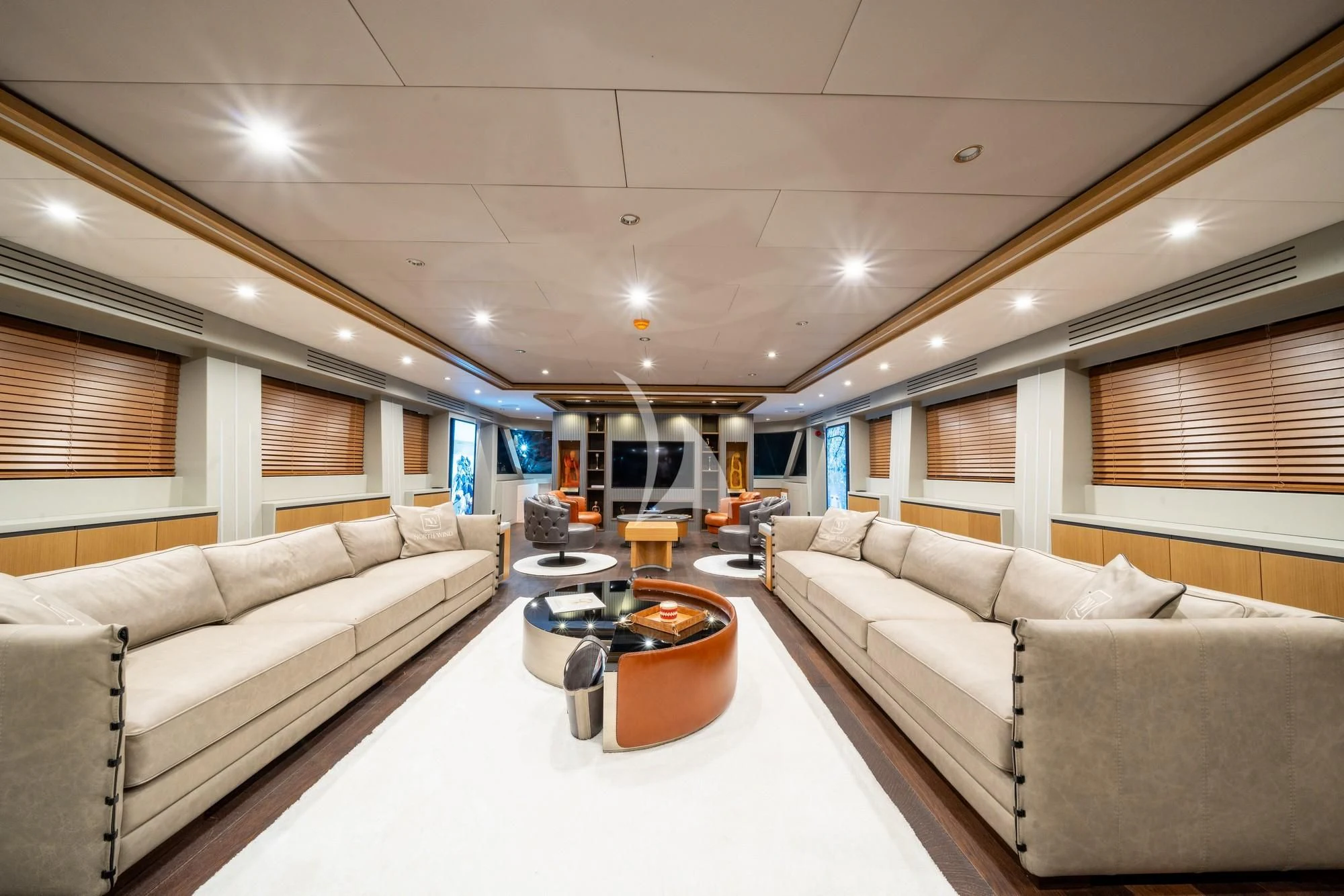 a living room with a couch and a table aboard NORTH WIND Yacht for Sale