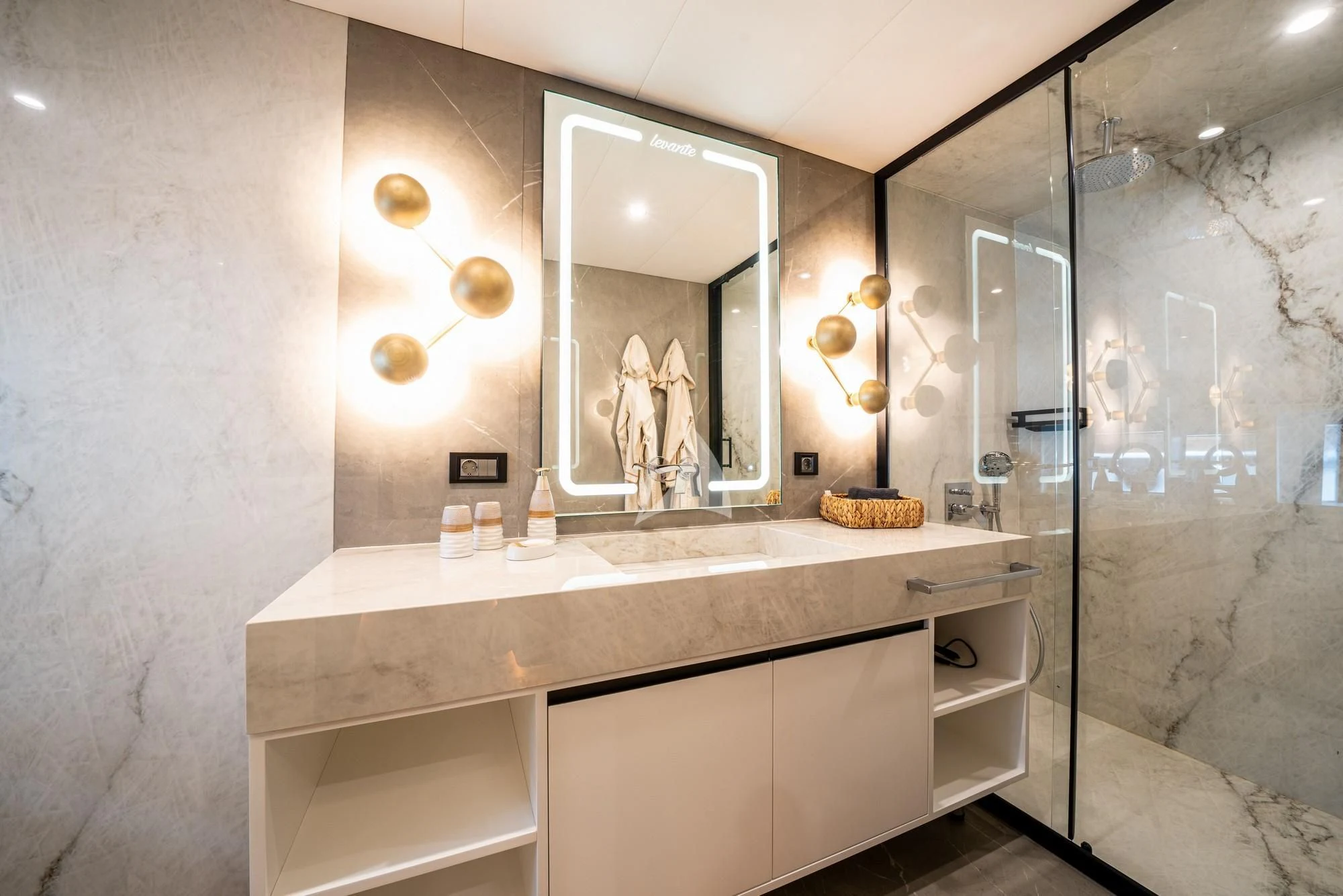 a bathroom with a large mirror aboard NORTH WIND Yacht for Sale