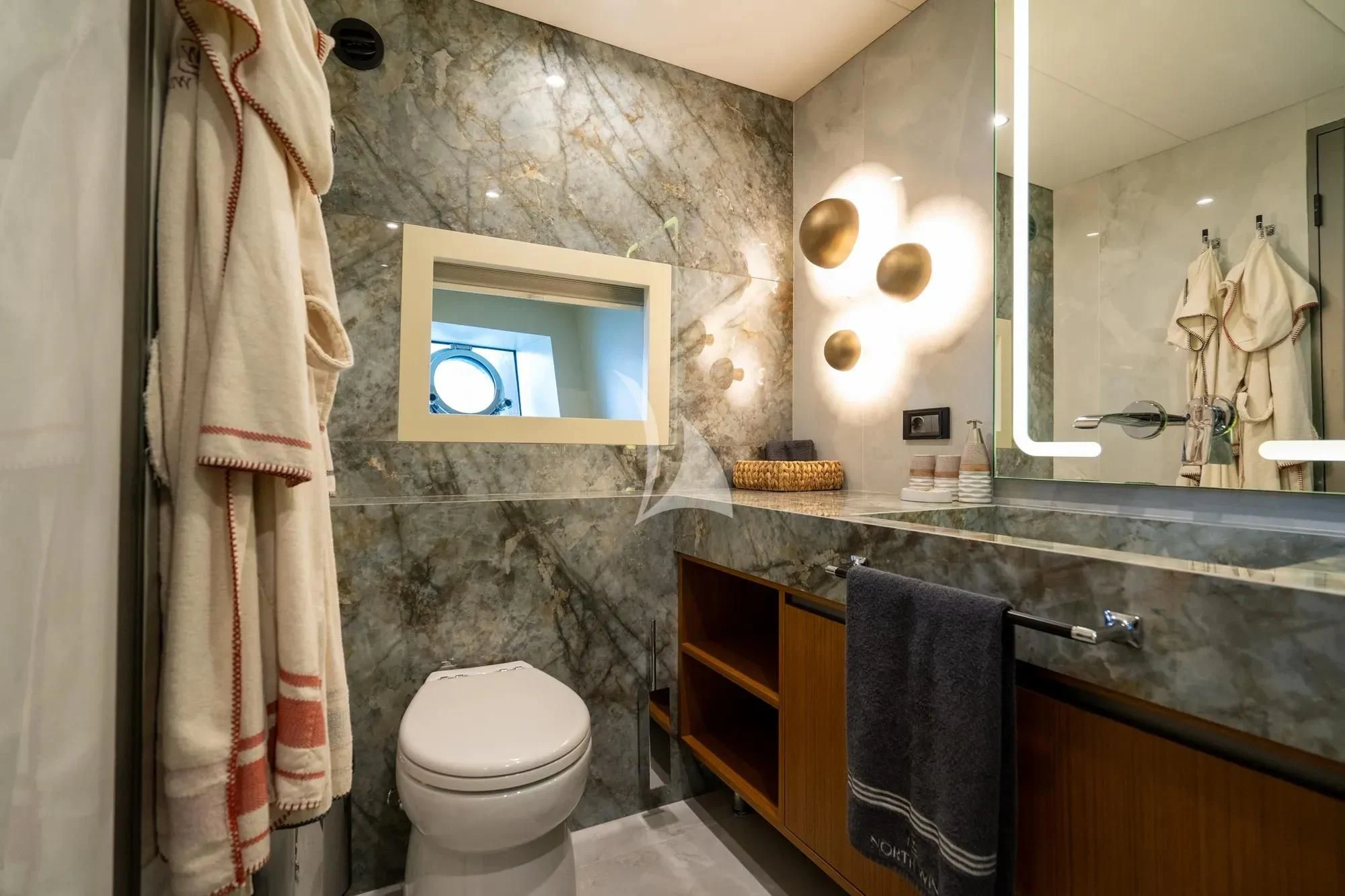 a bathroom with a marble countertop aboard NORTH WIND Yacht for Sale