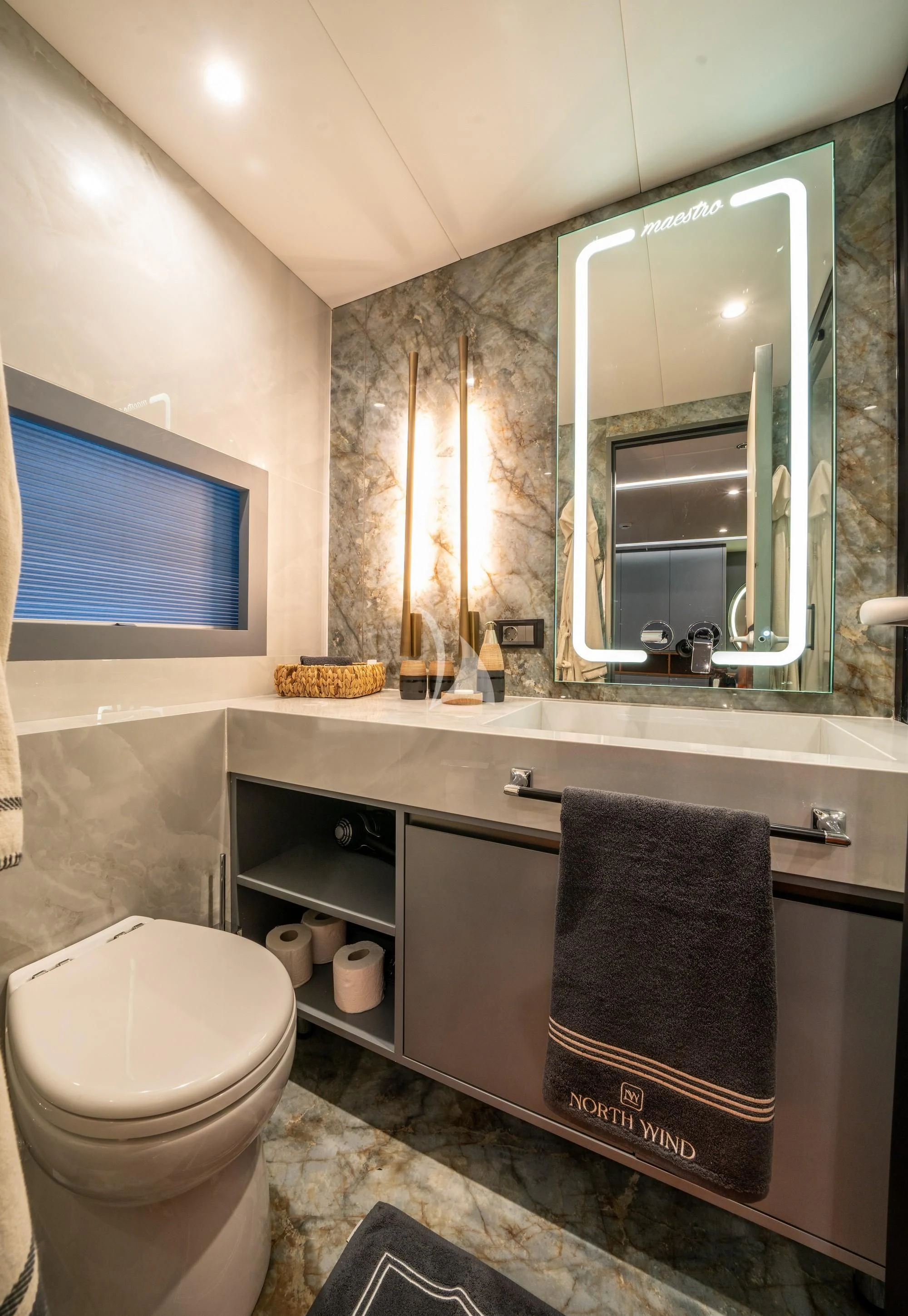 a bathroom with a large mirror aboard NORTH WIND Yacht for Sale