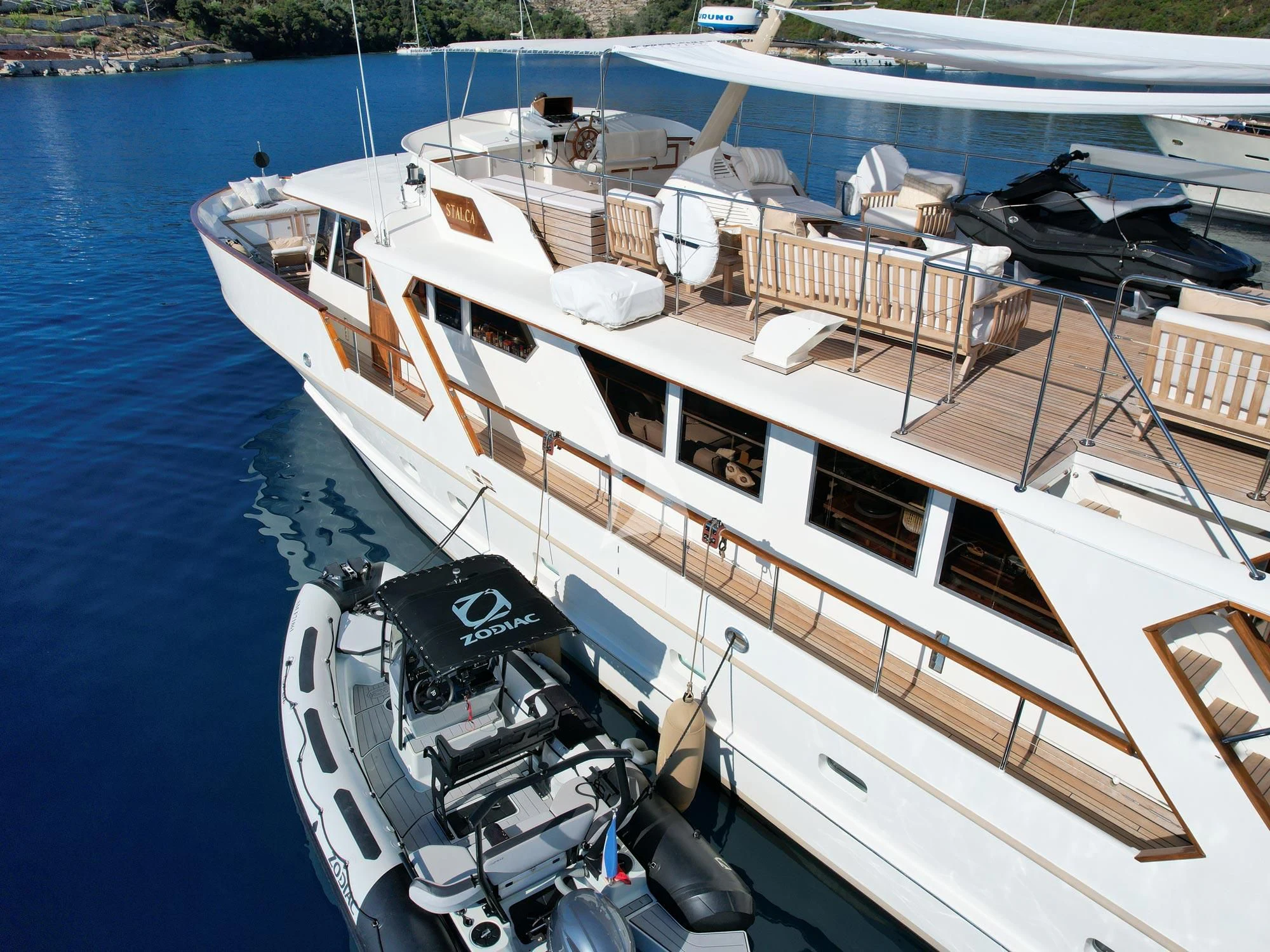 a large cruise ship docked aboard STALCA Yacht for Sale