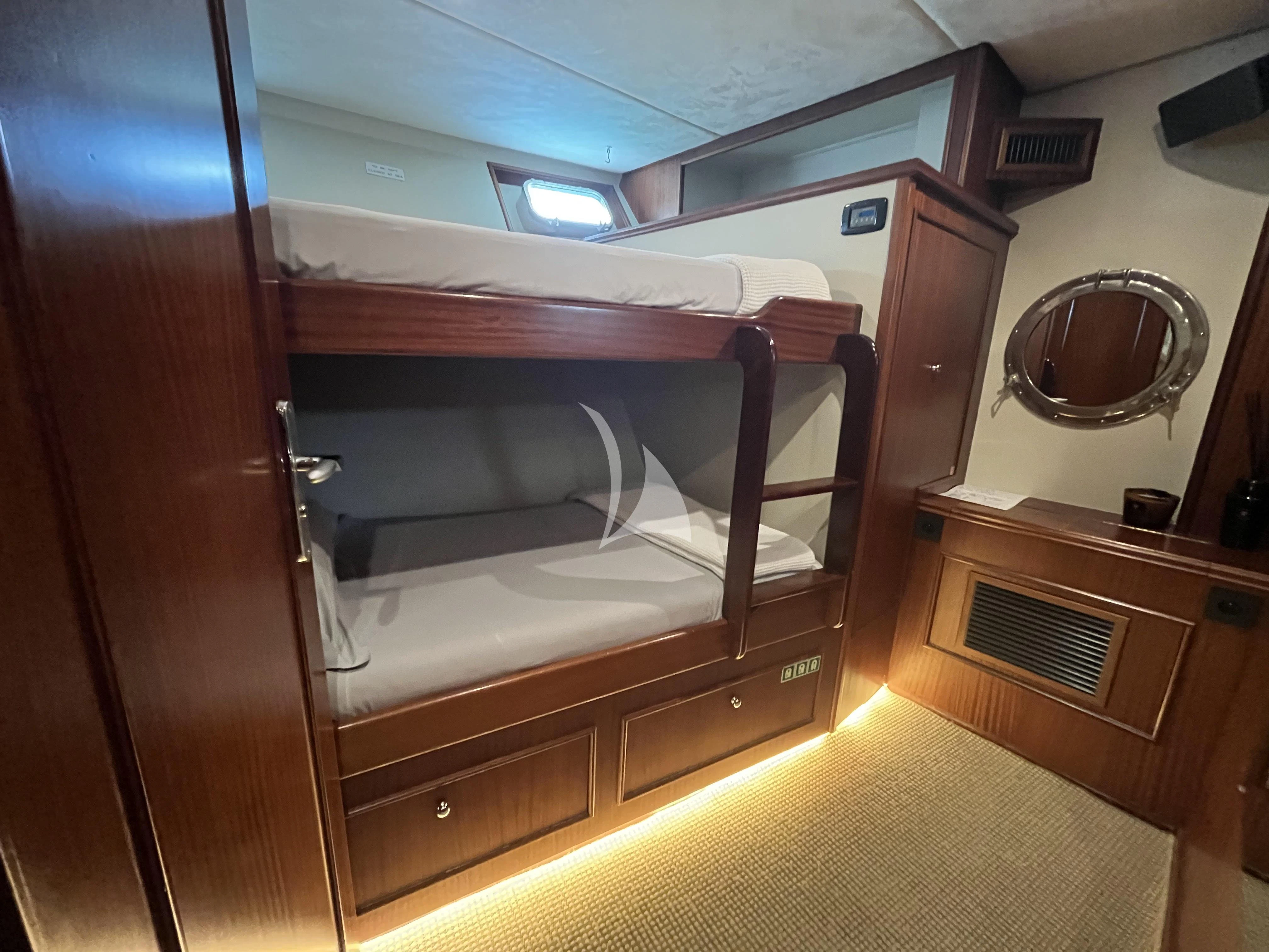 a car in a garage aboard STALCA Yacht for Sale