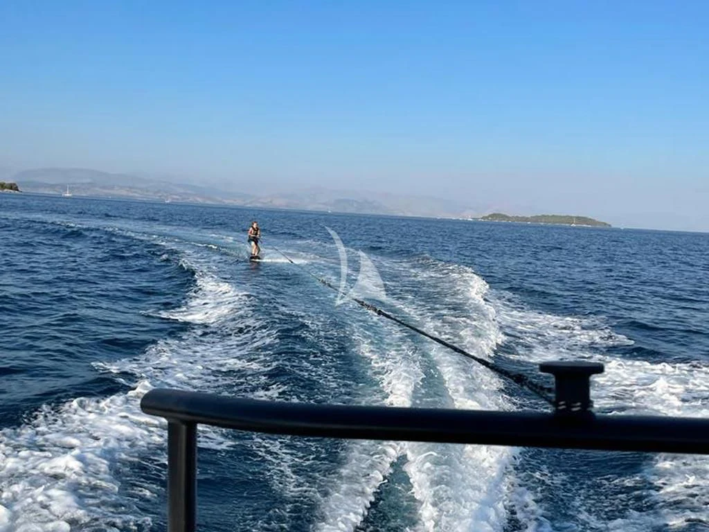 a person surfing on the waves aboard STALCA Yacht for Sale