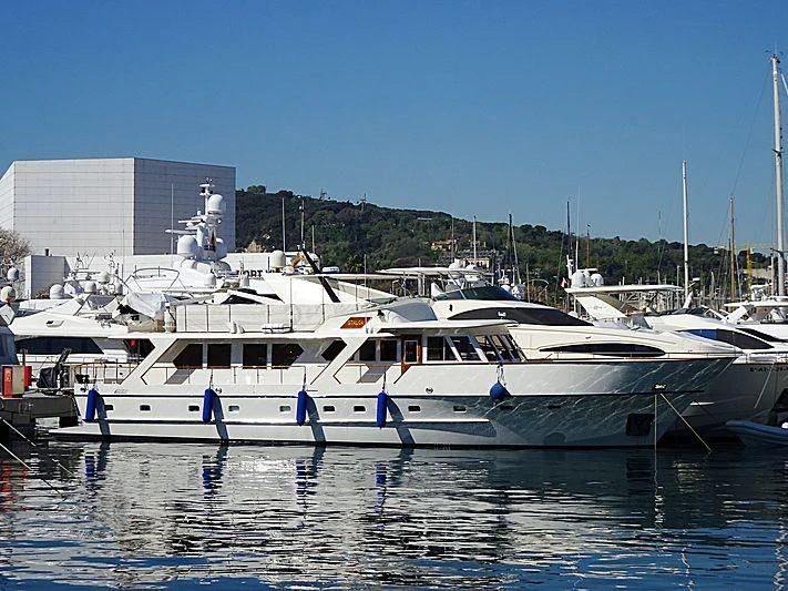 a couple of boats sit in a harbor aboard STALCA Yacht for Sale