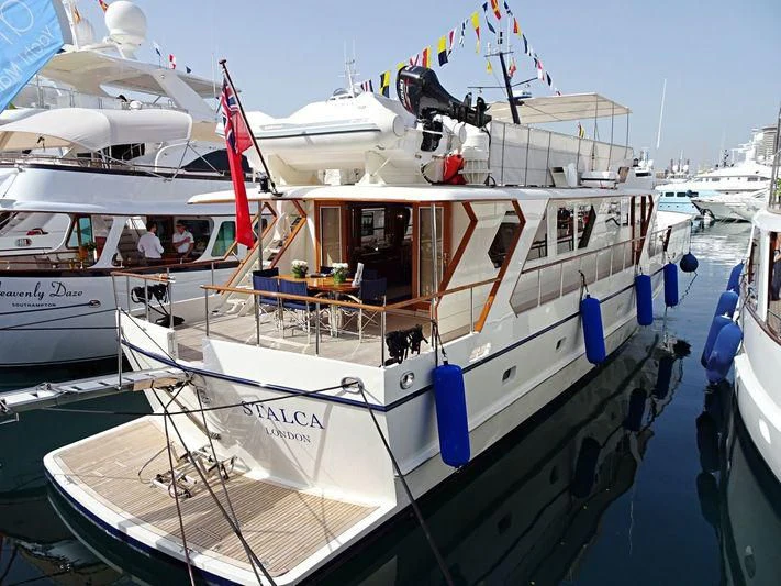 a boat docked at a pier aboard STALCA Yacht for Sale