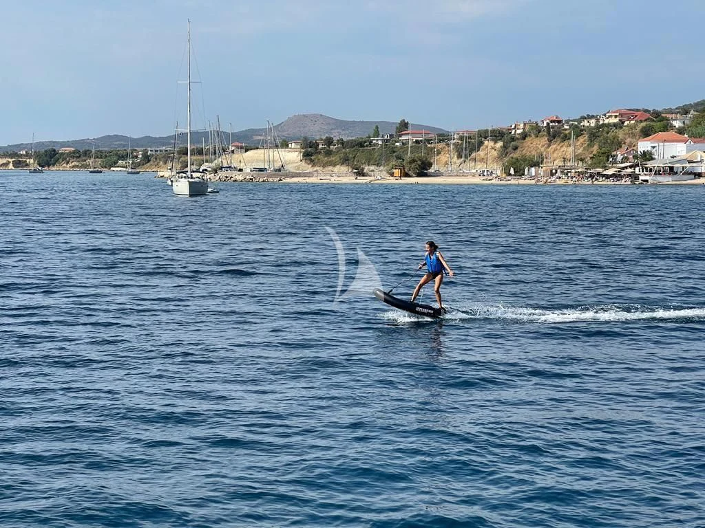 a person surfing on the water aboard STALCA Yacht for Sale