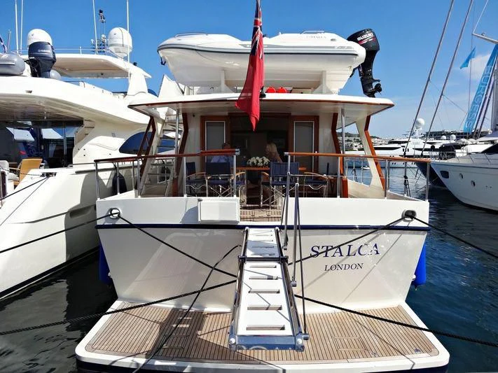 a boat docked at a pier aboard STALCA Yacht for Sale