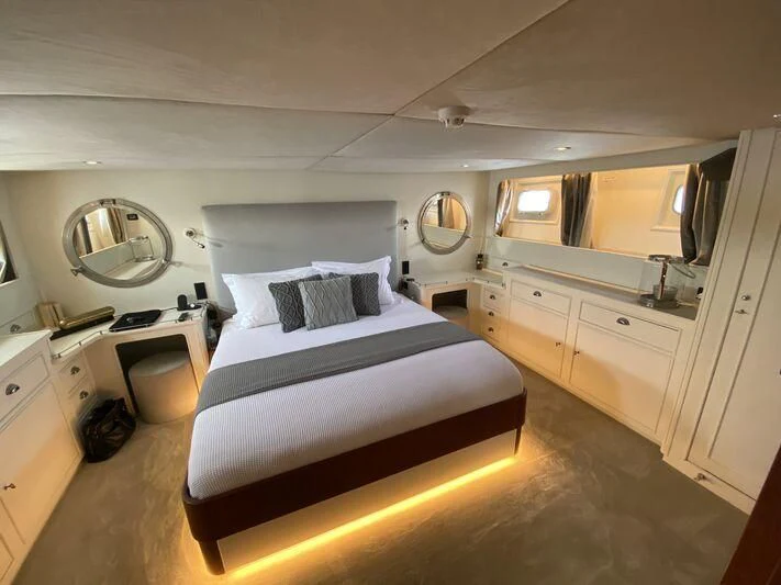 a bedroom with a bed aboard STALCA Yacht for Sale