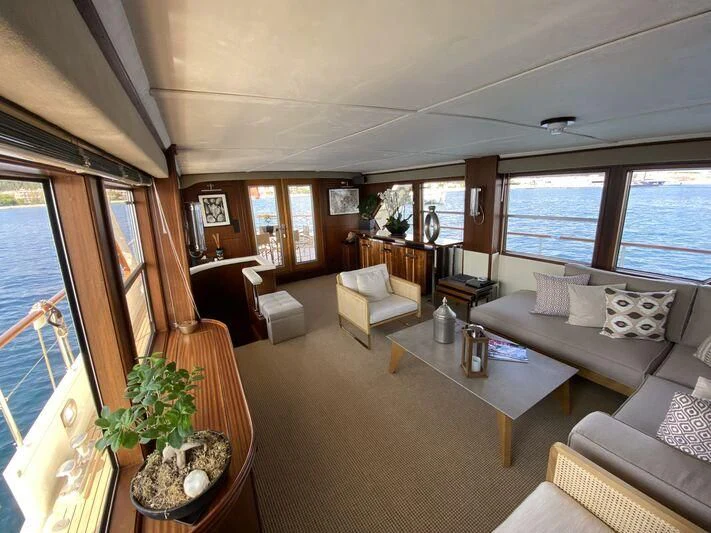 a living room with a large window aboard STALCA Yacht for Sale