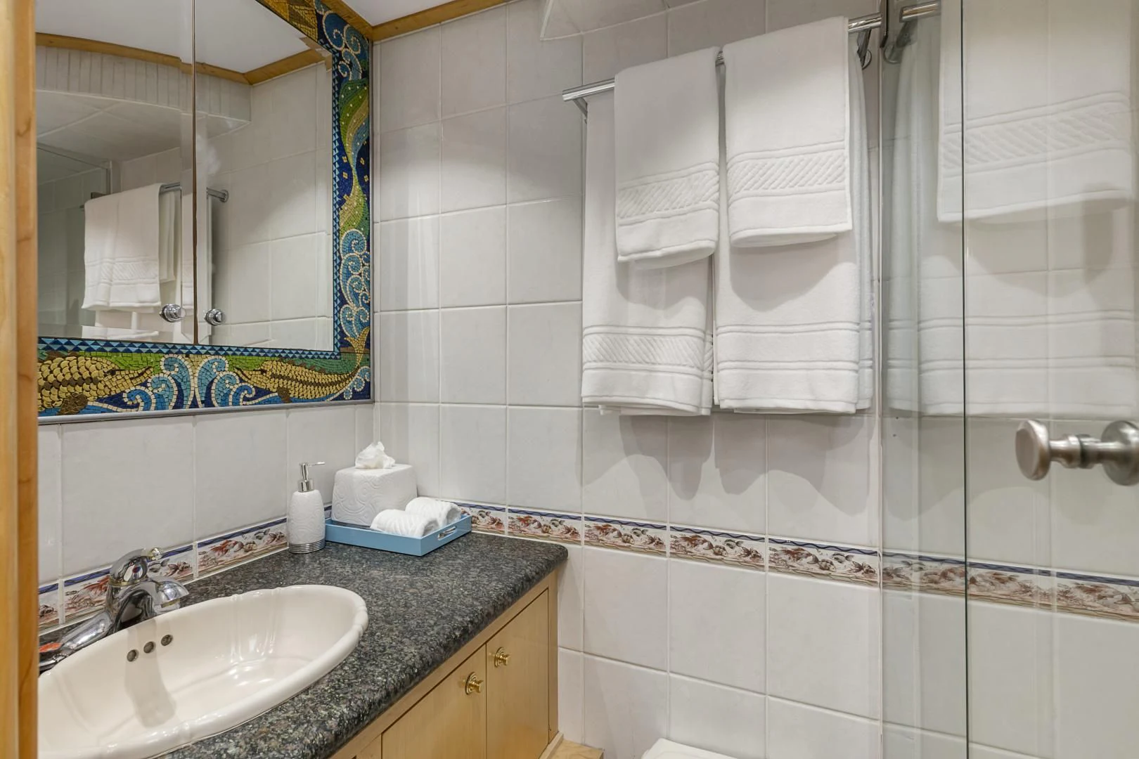 a bathroom with a sink and towels aboard HOLIDAY Yacht for Sale