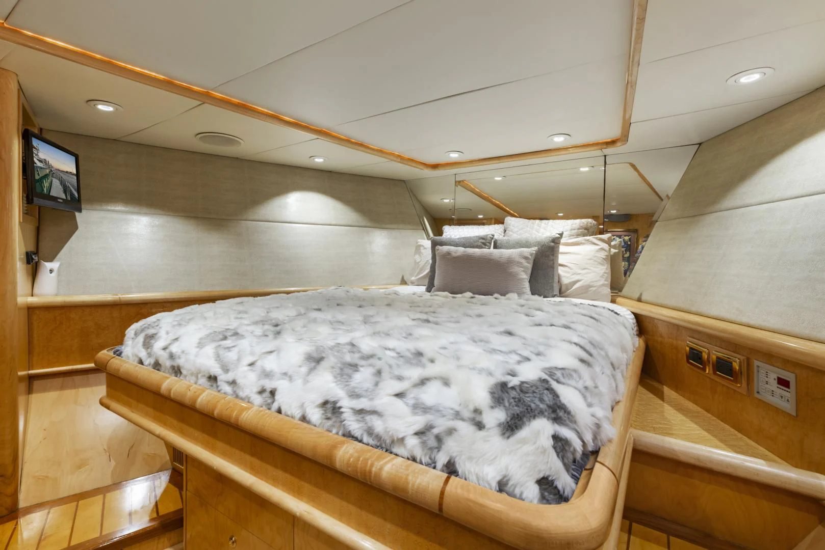a bed in a room aboard HOLIDAY Yacht for Sale