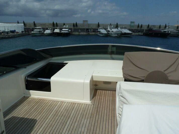 a deck with boats on it aboard TYAMO Yacht for Sale