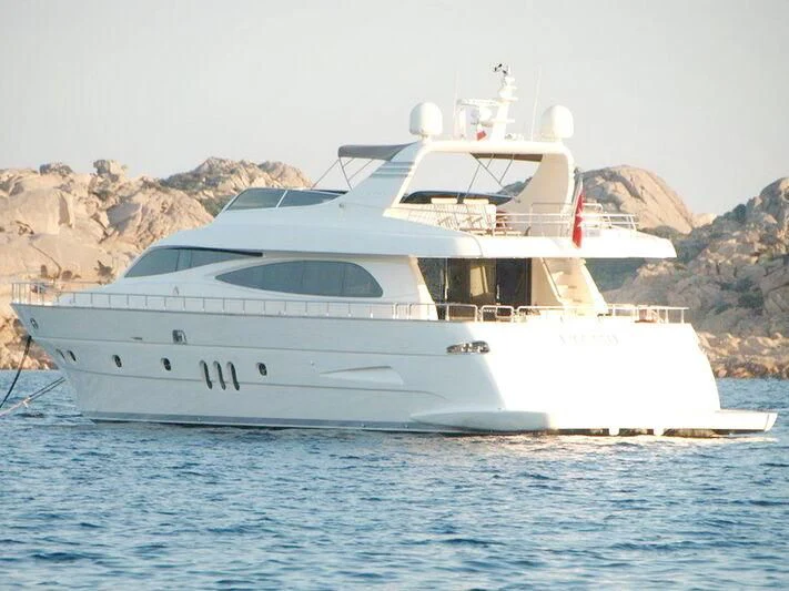 a white yacht in the water aboard TYAMO Yacht for Sale