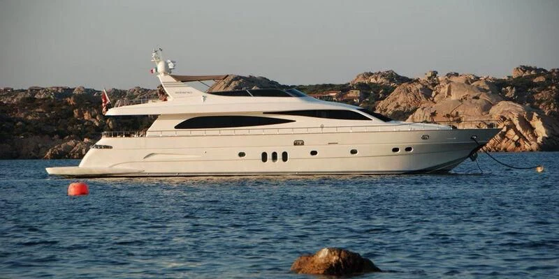 a white yacht in the water aboard TYAMO Yacht for Sale