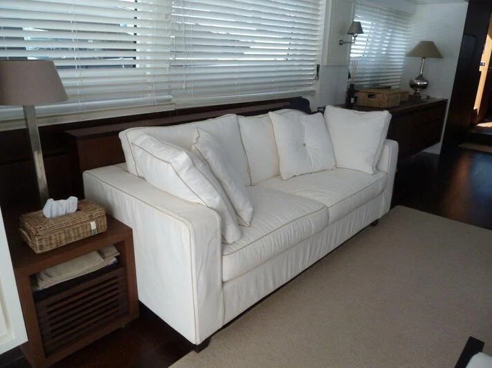 a bed in a room aboard TYAMO Yacht for Sale