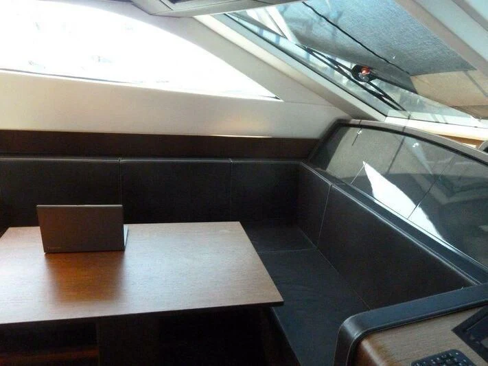 a car with a table aboard TYAMO Yacht for Sale